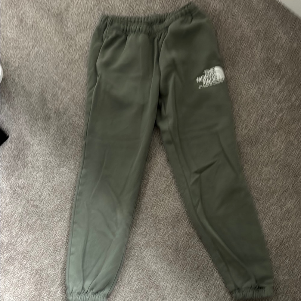 The North Face Green Sweatpants with Relaxed Fit and Tapered Legs